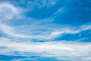 White clouds and blue sky background in sunshine day - Save the earth concept.
