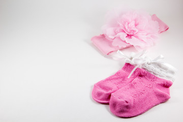 Bow and booties on a white background