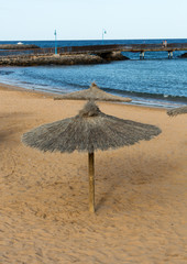 Straw umbrella on the beach