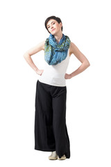 Young short hair brunette with hands on hips with bossy look at camera. Full body length portrait isolated over white studio background.