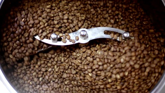 Roasting coffee beans.