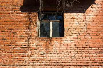 Old window in a brick wall