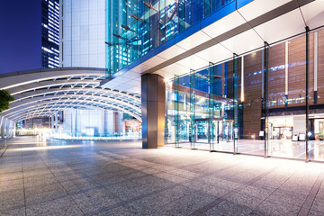 modern office buildings in tokyo at night