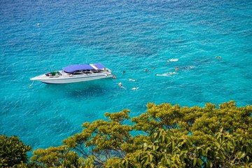 Beautiful tropical Similan island in sunny day blue sky background - Travel summer beach holiday concept.