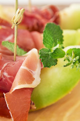 Appetizers: melon with ham