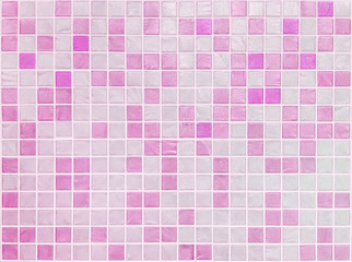 Closeup surface tiles pattern at pink tiles in bathroom wall texture background