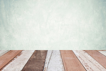 Perspective vintage wood over green cement wall background