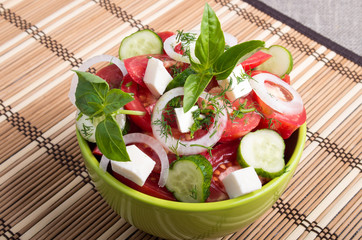 Green bowl with tasty and wholesome vegetarian meal