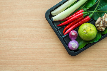 Flat lay of Thai food ingredients cooking on wooden table background	