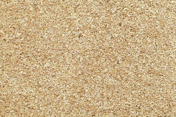 Organic dry Ginger (Zingiber officinale) in tea cut size. Macro close up background texture. Top view.