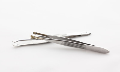 Two tweezers on a white background