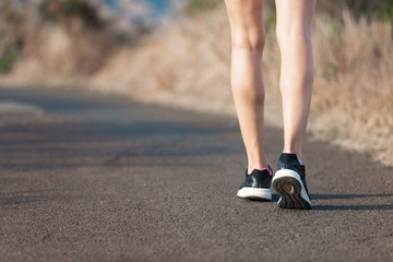 Closeup of woman's feet walking. 