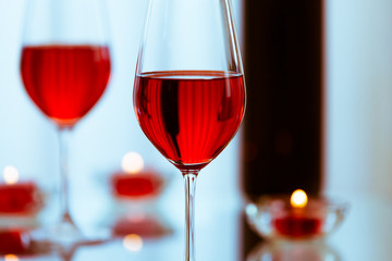 Wine glass on table.