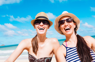 Happy girls on the beach.