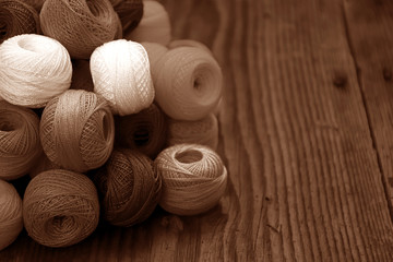 Fototapeta na wymiar Crochet yarn balls on the floor old