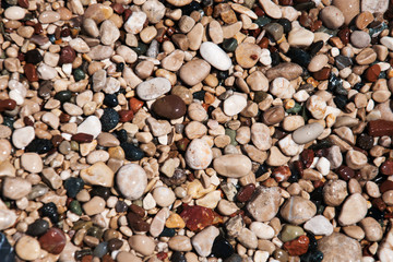 Fototapeta premium stones on beach and sea water