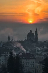 Schilderijen op glas Beautiful St. Nicolas church during foggy sunrise and amazing cloudy sky, Prague, Czech republic © marekkijevsky