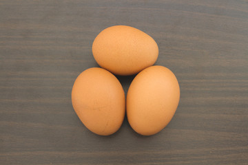 Eggs On Wooden / Freshness Of The Three Eggs For Cooking On Wooden Background.