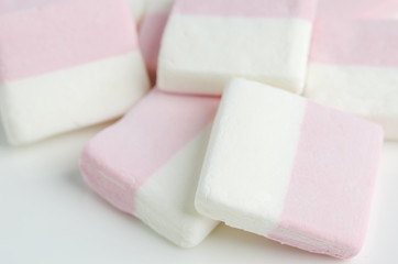 Close up of pink and white marshmallows