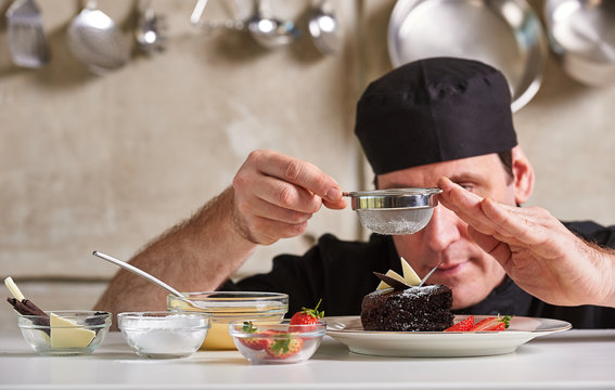 Restaurant hotel private chef preparing desert chocolate cake