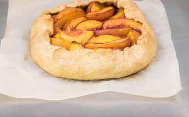 Baked homemade spiced peach galette.