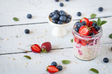 Healthy breakfast: overnight oats with fresh strawberries