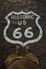 Historic route 66 mark on asphalt surface