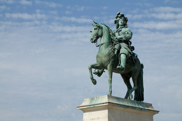 Paris - July 20, 2016: statue of Louis XIV, Versailles Palace