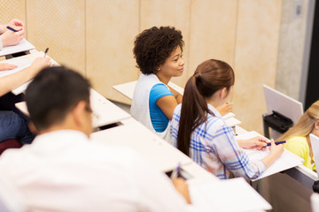 group of international students in lecture hall