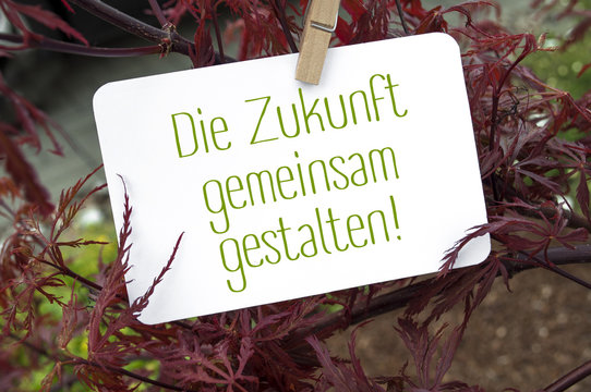 Roter japanischer Ahorn mit Die Zukunft gemeinsam gestalten