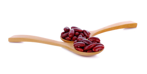 red bean in a spoon on white background