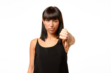 Rebellious negative woman giving a thumbs down