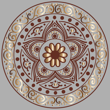 Drawing of a floral mandala in brown and gold colors on a dark gray background