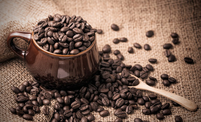 coffee beans in cup, vintage and dark tone