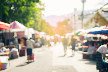 Blurred image of street market, split retro tone color effected