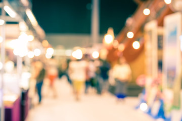 Obraz premium Blurred image of street market, split retro tone color effected