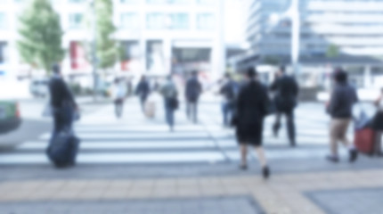Fototapeta na wymiar Blurred image of Business people walking on street, Abstract blu