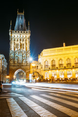 Fototapeta na wymiar Night Traffic near Powder Tower or Powder Gate in Prague, Czech Republic