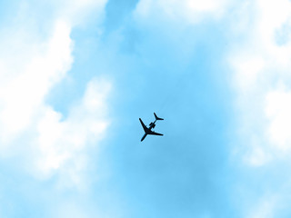 Plane in the blue sky