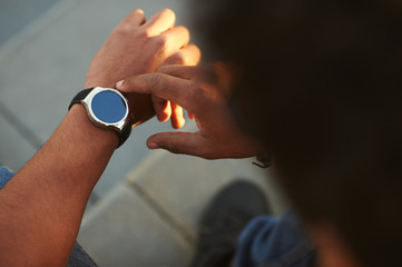 Black Male hand with Smart Watch on wrist