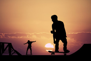 skateboarder at sunset