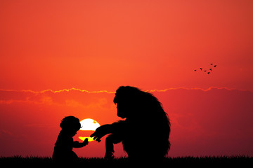 monkey and baby at sunset