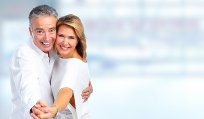 Happy dancing senior couple.