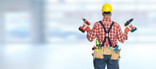 Electrician with drill.