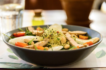 Fresh Salad With Mozzarella, Chicken, Tomatoes, Almonds And Onion Germs