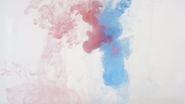 Colourfull background abstraction. Red and blue Ink in water. HD.