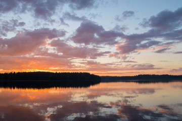 Naklejka na ściany i meble Sunset lake view, Finland.