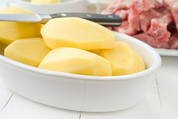 raw potatoes and other items ready to be cooked