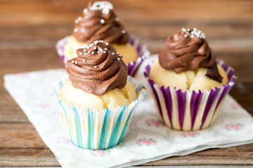 Vanilla cupcake with chocolate topping.