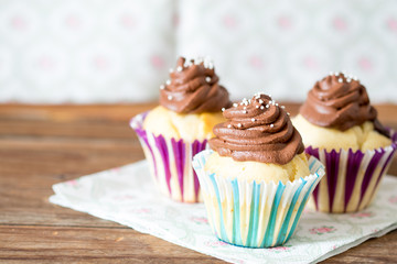 Vanilla cupcake with chocolate topping.